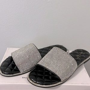 Black and silver sandals. Worn once and size 6.